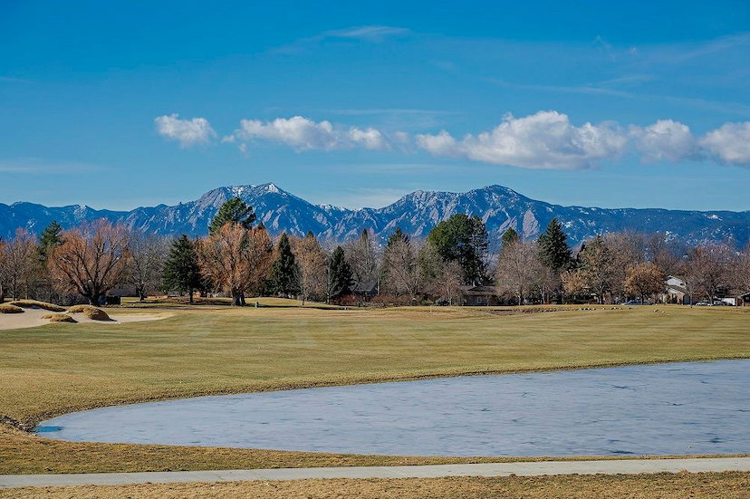 CASUALLY SOPHISTICATED HOME WITH STYLISH RENOVATIONS AND SERENE MOUNTAIN & GOLF COURSE VIEWS