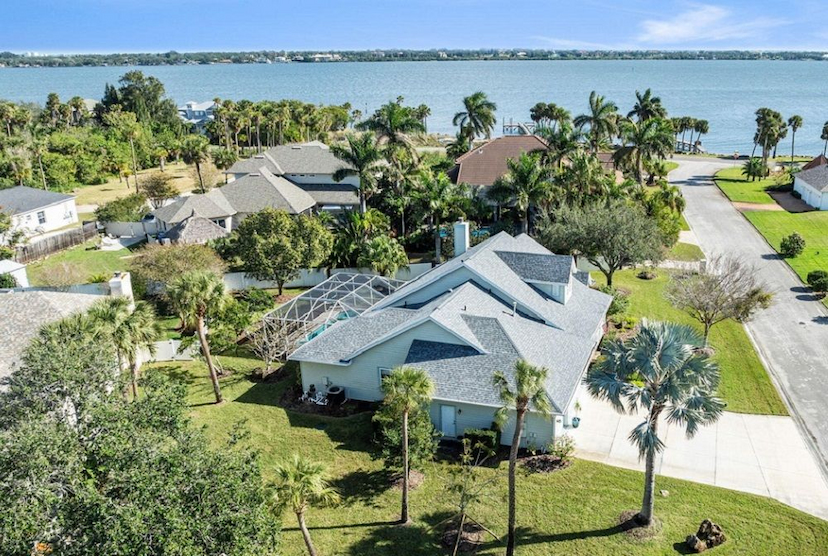 ENJOY SERENE VIEWS OF THE INDIAN RIVER FROM YOUR FRONT PORCH ROCKERS