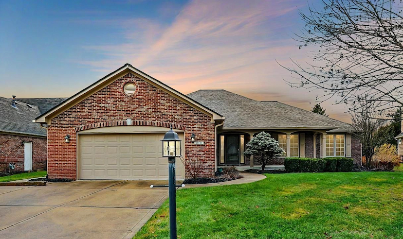 A CHARMING ALL-BRICK CUSTOM HOME