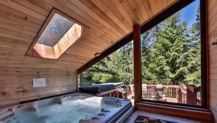 STUNNING RIVERFRONT MOUNTAIN RETREAT