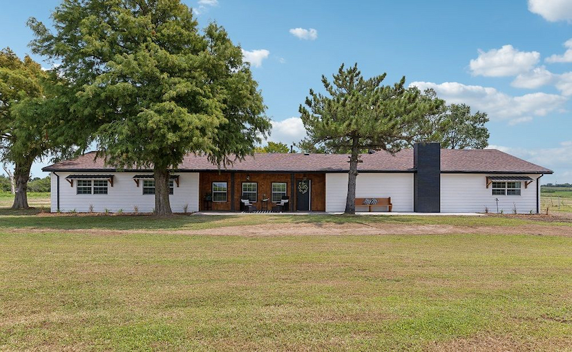 LARGE POND AND SPACIOUSFRONT PORCH