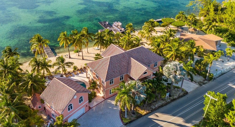 OCEANFRONT OPULENCE: EXCLUSIVE 200-FOOT BEACHFRONT ESTATE IN GRAND CAYMAN