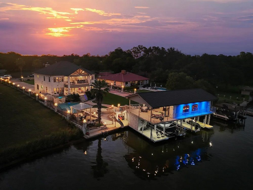 LUXURIOUS WATERFRONT ESTATE, 120’ OPEN WATERFRONT