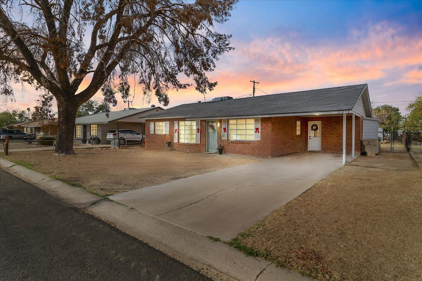 A HOME WITH STYLE & CHARM!