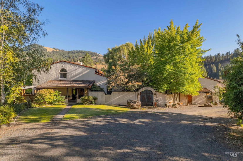 SECLUDED OASIS ON 103+ ACRE PROPERTY