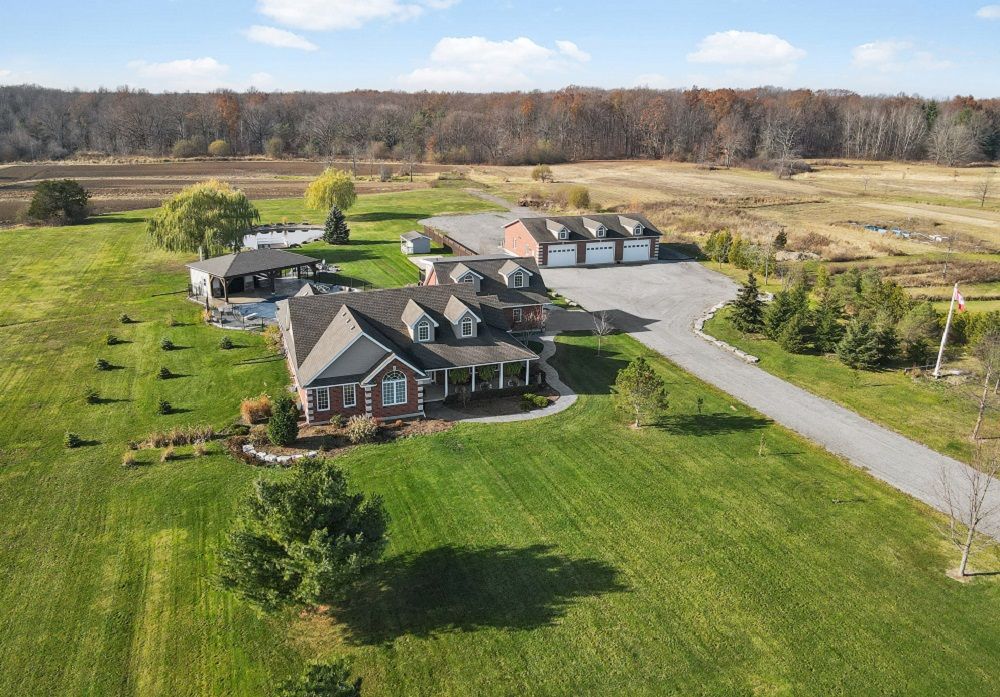 HERE IS YOUR DREAM HOME, A PRESTIGIOUS 12-ACRE ESTATE.
