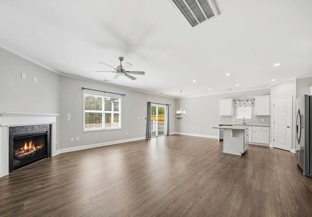 Charming Home With Bonus Room Open Layout & Covered Outdoor Living