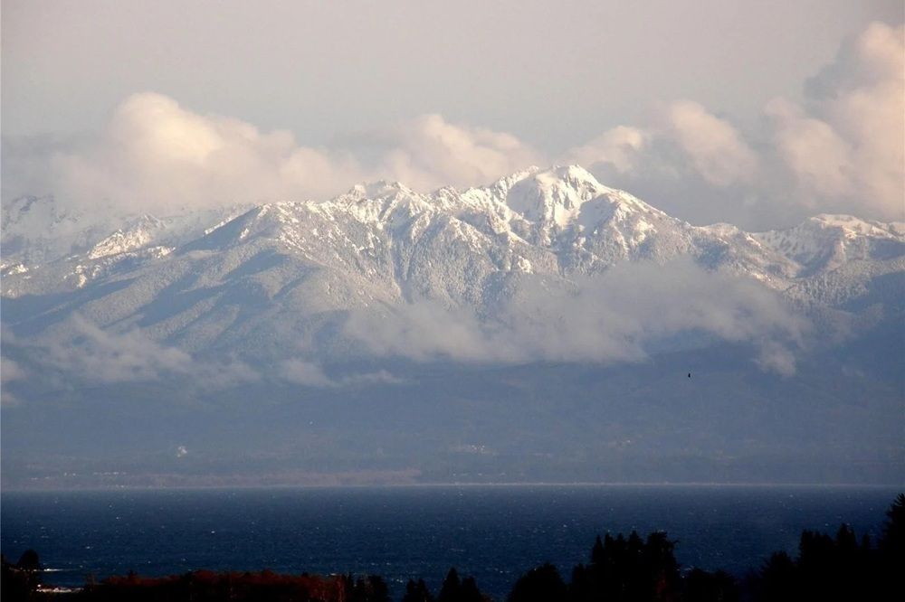 Views Across The Strait Of Juan De Fuca To The Olympic Mountains In Washington State