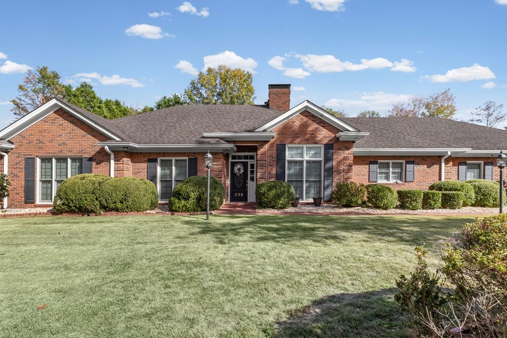 Custom Brick Ranch On Two Level North Coweta Lots