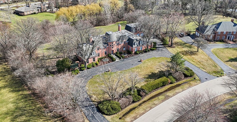 Luxury Custom Estate With Carriage House And Expansive Grounds