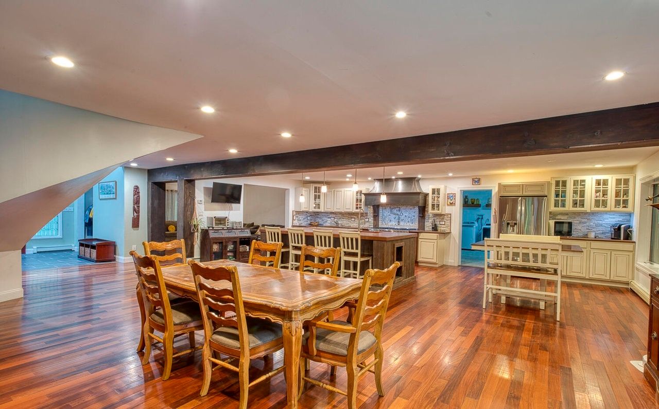 Contemporary Home With Renovated Interiors, Gourmet Kitchen, And Reservoir Views