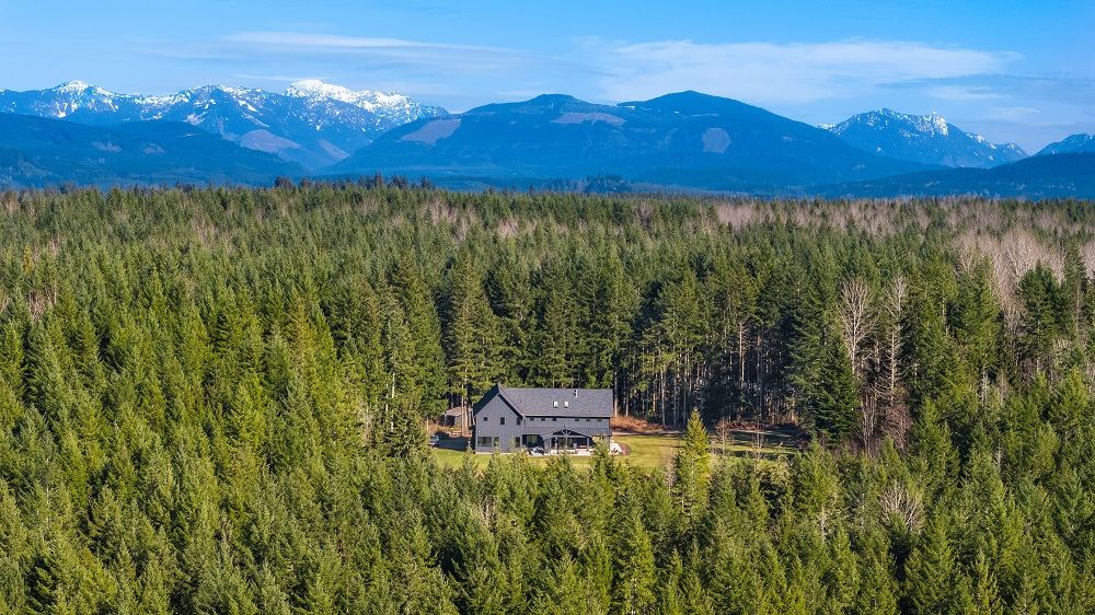 Exceptional Carnation Gated Estate Offers Unparalleled Privacy & Tranquility On 20+ Acres