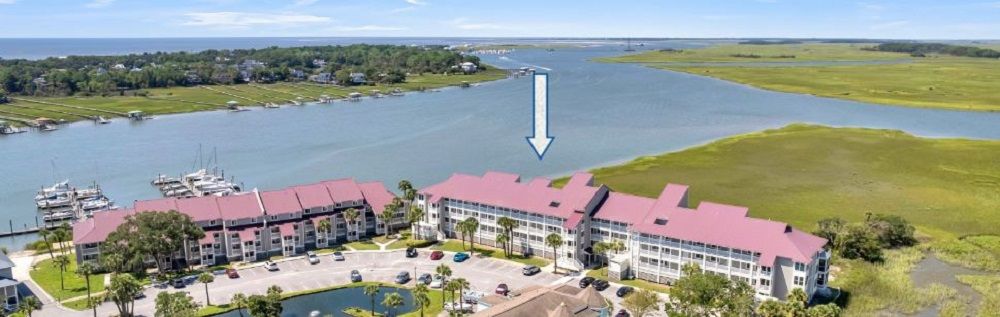 "Lock It And Leave It! Gated, Incredible Water Views And Minutes Minutes To The Beach! "