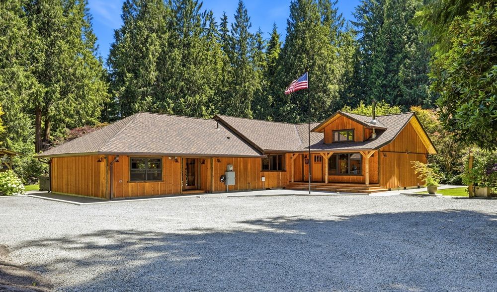 Private Gated Entry And Nestled Among Towering Evergreens