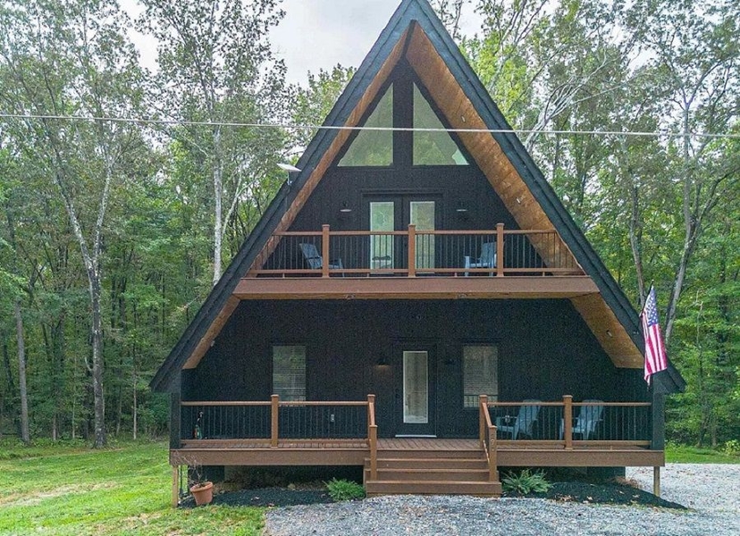 A Bold Architectural Gem Tucked Away On Three Wooded Lots