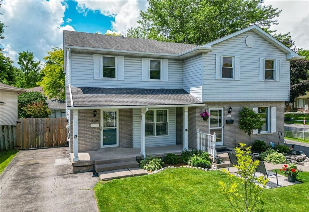 Comfort & Charm On A Fully Fenced, Tree-Filled Lot