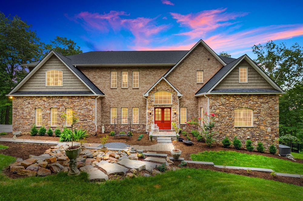 Custom Brick & Stone Retreat With Mountain Views