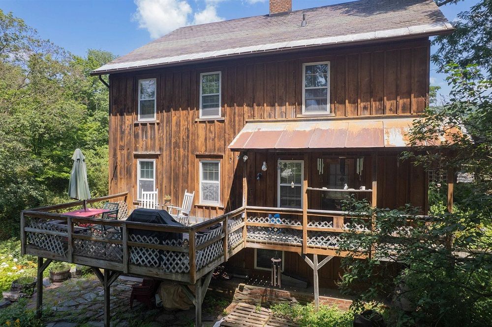 Stunning Riverfront Living In A Historic Treasure!