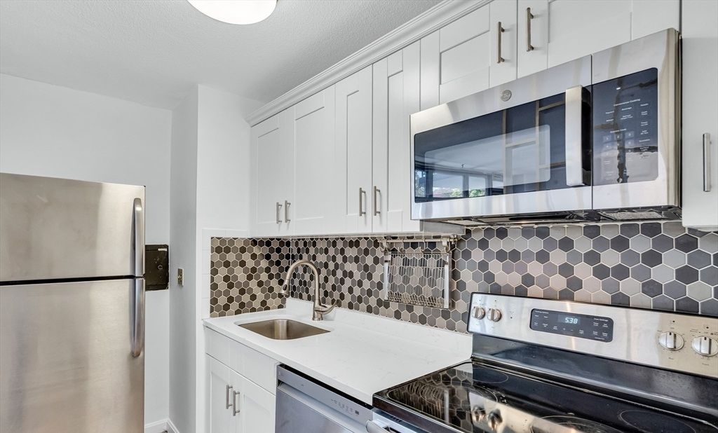 Well-Maintained Unit In Belmont’s Desirable Cushing Square