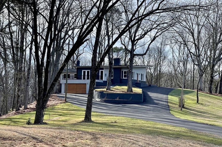 Modern Lake Retreat With Instant Equity & Private Acreage