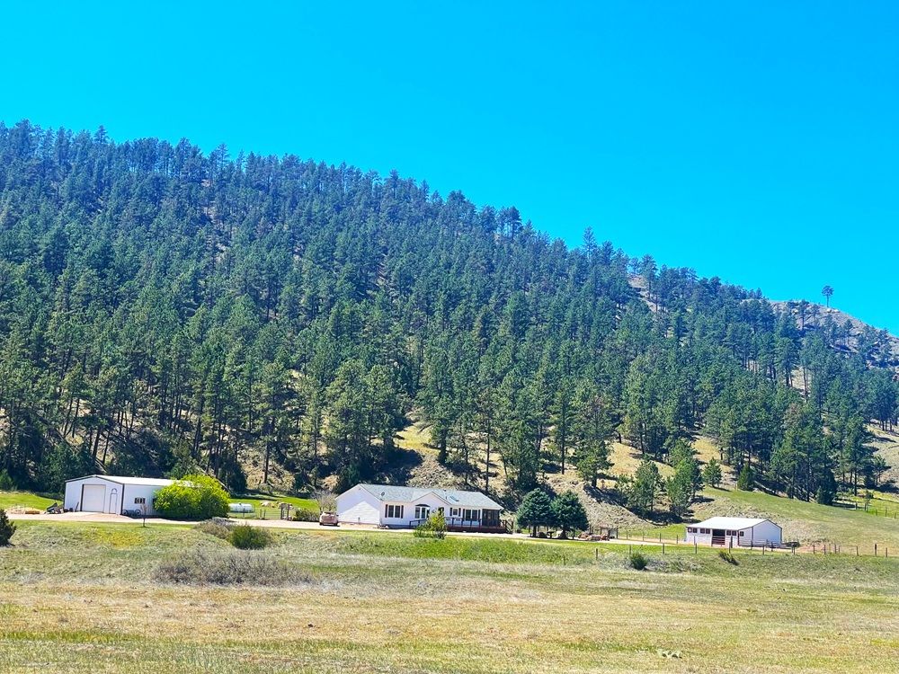 Stunning 25 Acre Horse Property, Surrounded On Two Sides By Game Fish And Park Acreage And Black Hills Forest