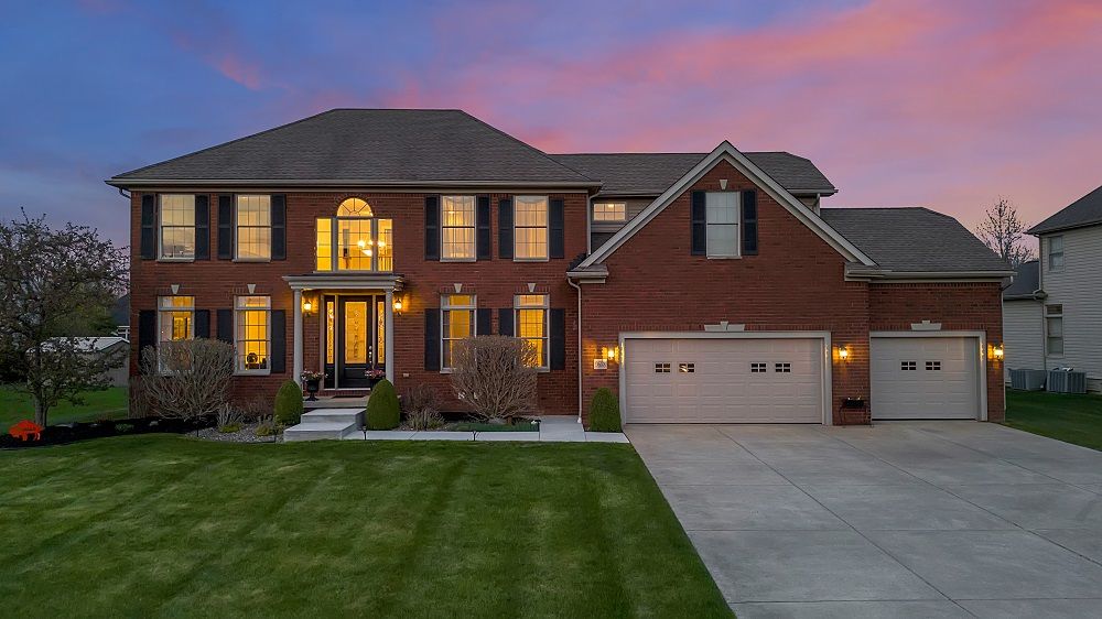 Elegant Colonial With Custom Finishes, Exceptional Living Space & Outdoor Oasis