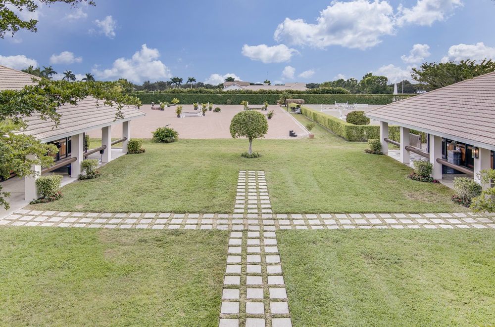 The Ultimate 8.39 Acre Show Barn On A Coveted Triple Lot In Grand Prix Village