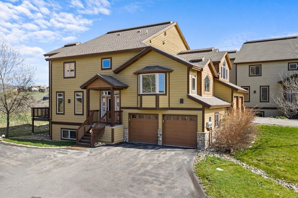 One Of The Largest Townhomes In The Longview Park Development With Two River-Rock Fireplaces.