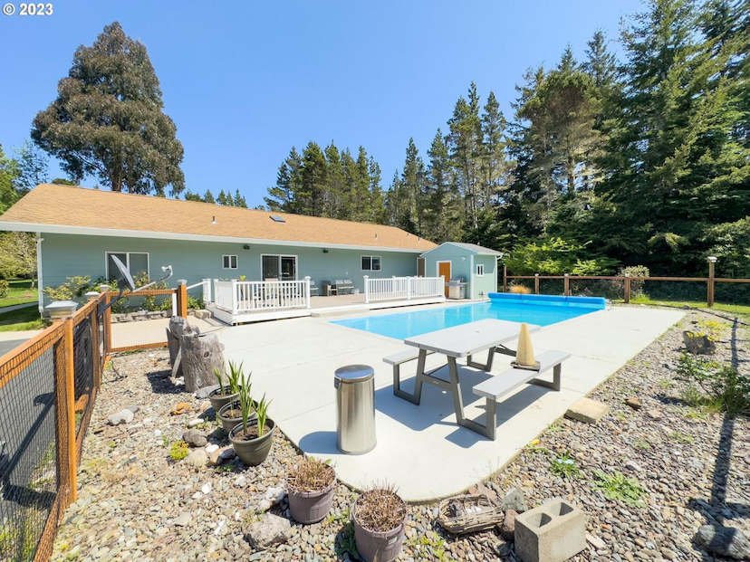 Bandon Acreage with 2 Homes, Pool, and Huge Shop