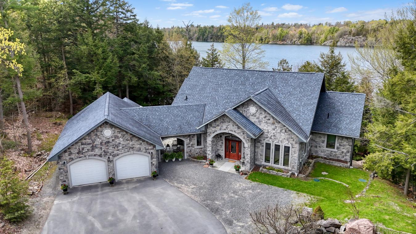 Stunning custom-built ICF stone façade bungalow