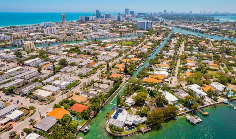 TIMELESS WATERFRONT ELEGANCE ON BISCAYNE POINT ISLAND